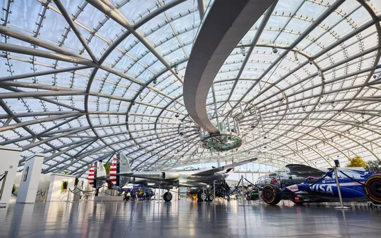 Interior view of Hangar-7 showing its glass-and-steel architecture and exhibits in the exhibition